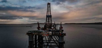 oil-and-gas-drilling-platform-at-sea-at-sunset-2023-11-27-04-54-01-utc